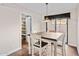 Cozy dining area with hardwood floors and an adjacent pantry at 3174 E Marlette Ave, Phoenix, AZ 85016