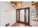 Elegant entryway featuring a wood door with ornate glass and hardwood floors at 3174 E Marlette Ave, Phoenix, AZ 85016