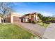 House exterior with double garage and landscaping at 3174 E Marlette Ave, Phoenix, AZ 85016