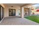 Covered patio with brick pavers and view of backyard at 3174 E Marlette Ave, Phoenix, AZ 85016