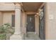 Condo entrance with wrought iron door and columns at 3491 N Arizona Ave # 98, Chandler, AZ 85225