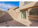 Back patio with sliding glass doors and exterior storage at 3491 N Arizona Ave # 98, Chandler, AZ 85225