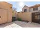 Small private patio with storage unit and AC unit at 3491 N Arizona Ave # 98, Chandler, AZ 85225