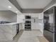 Modern kitchen with stainless steel appliances and white cabinets at 355 E Thomas Rd # B206, Phoenix, AZ 85012