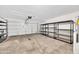 Garage with extra shelving for storage at 3702 W Naomi Ln, San Tan Valley, AZ 85144