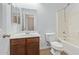 Clean bathroom, includes a shower/tub combo and wood vanity at 3923 E Kesler Ln, Gilbert, AZ 85295