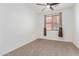 Spacious bedroom with carpeted floor and window coverings at 3923 E Kesler Ln, Gilbert, AZ 85295