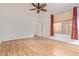 Bedroom with ceiling fan, window blinds, and carpet flooring at 3923 E Kesler Ln, Gilbert, AZ 85295