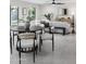 Bright dining area with stylish furniture adjacent to the living room at 4059 E Cholla St, Phoenix, AZ 85028