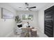 Home office with a desk, chair, and natural light from the window at 4059 E Cholla St, Phoenix, AZ 85028