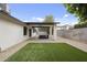 Charming covered patio with comfortable seating area, perfect for outdoor relaxation and entertaining at 4059 E Cholla St, Phoenix, AZ 85028