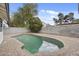 Inviting swimming pool surrounded by a brick patio and block wall for backyard privacy at 4059 E Cholla St, Phoenix, AZ 85028