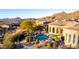 Luxury home with a beautiful pool and mountain backdrop at 4208 N Via Cobre Cir, Mesa, AZ 85207