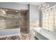 Spa-like bathroom with walk-in shower and soaking tub at 4208 N Via Cobre Cir, Mesa, AZ 85207