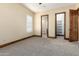 Spacious bedroom with private access to bathroom and walk-in closet at 4208 N Via Cobre Cir, Mesa, AZ 85207