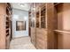 Large walk-in closet with ample shelving and hanging space at 4208 N Via Cobre Cir, Mesa, AZ 85207