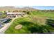 Golf course clubhouse with parking and putting green at 4208 N Via Cobre Cir, Mesa, AZ 85207