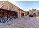 Garage with checkered floor and built-in storage at 4208 N Via Cobre Cir, Mesa, AZ 85207