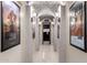 Elegant hallway with arched entryways and movie posters at 4208 N Via Cobre Cir, Mesa, AZ 85207