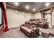 Luxurious home theater with brown leather seating at 4208 N Via Cobre Cir, Mesa, AZ 85207