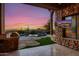 Outdoor patio with pool, grill, and stunning sunset views at 4208 N Via Cobre Cir, Mesa, AZ 85207