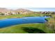 Serene pond with fountain in a golf course community at 4208 N Via Cobre Cir, Mesa, AZ 85207