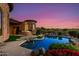 Inviting pool and patio area with a beautiful sunset backdrop at 4208 N Via Cobre Cir, Mesa, AZ 85207