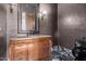 Powder room with ornate vanity and marble flooring at 4208 N Via Cobre Cir, Mesa, AZ 85207