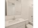 Clean bathroom featuring white countertop, sink, toilet, and shower-tub combination, offering a calming space at 4267 W Jeanette Ln, San Tan Valley, AZ 85144