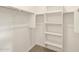 Walk-in closet features built-in shelving and a clothes rod at 4267 W Jeanette Ln, San Tan Valley, AZ 85144