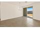 Bright dining room with tile flooring, chandelier, and sliding glass door at 4267 W Jeanette Ln, San Tan Valley, AZ 85144