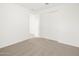 Carpeted bedroom with neutral paint, a closet, and an open doorway at 4287 W Jeanette Ln, San Tan Valley, AZ 85144