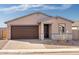 Charming single-story home featuring a brick driveway and a two-car garage at 4287 W Jeanette Ln, San Tan Valley, AZ 85144