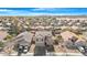 Aerial view of house and surrounding neighborhood at 43815 W Carey Dr, Maricopa, AZ 85138