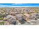 Aerial view of house and surrounding neighborhood at 43815 W Carey Dr, Maricopa, AZ 85138