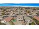 Aerial view of a neighborhood, highlighting a two-story house with a backyard at 43815 W Carey Dr, Maricopa, AZ 85138