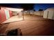 Backyard patio with covered seating area and storage shed at 4417 N 70Th Ave, Phoenix, AZ 85033