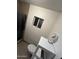 Bathroom with toilet, shower, and small vanity at 4417 N 70Th Ave, Phoenix, AZ 85033