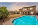 Large backyard with a sparkling blue pool at 4647 E County Down Dr, Chandler, AZ 85249