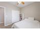 Bedroom with double doors and built-in shelving unit at 4647 E County Down Dr, Chandler, AZ 85249