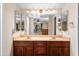 Bathroom with double vanity and large mirror at 4749 E Evergreen St, Mesa, AZ 85205