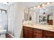 Bathroom with shower and double vanity at 4749 E Evergreen St, Mesa, AZ 85205