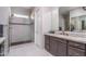 Bathroom with a large shower and granite countertops at 5080 N 184Th Ln, Litchfield Park, AZ 85340