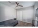 Cozy bedroom with double door closet and ceiling fan at 5080 N 184Th Ln, Litchfield Park, AZ 85340