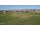 Expansive grassy area with mountain views at 5080 N 184Th Ln, Litchfield Park, AZ 85340