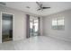 Spacious living room featuring light wood-look flooring at 5080 N 184Th Ln, Litchfield Park, AZ 85340