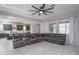 Open concept living room and kitchen with tile floors at 5080 N 184Th Ln, Litchfield Park, AZ 85340