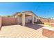 Backyard with large patio, masonry walls, and string lights at 7420 W Glass Ln, Laveen, AZ 85339