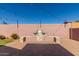 Outdoor kitchen and patio area with string lights at 7420 W Glass Ln, Laveen, AZ 85339