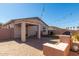 Backyard with patio, built-in grill, and covered sitting area at 7420 W Glass Ln, Laveen, AZ 85339